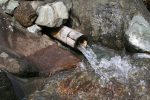 黒山温泉「東上閣」の庭園露天風呂の湯口