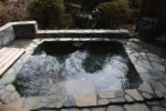 湯屋温泉「ニコニコ荘」の露天風呂